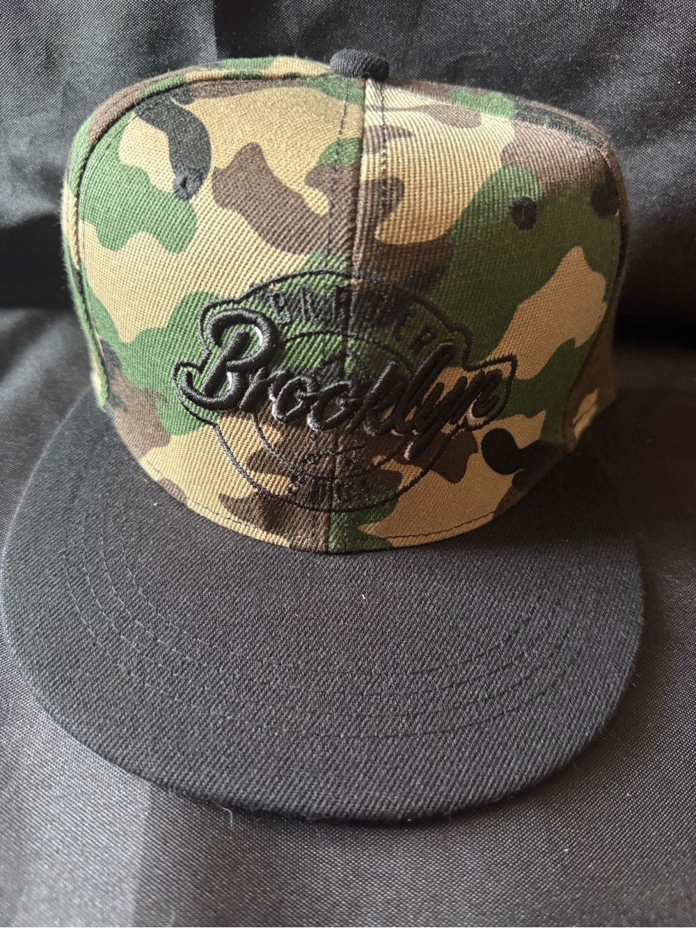 New Brooklyn Embroidered Camo Snapback Hat with Black Script Logo